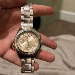 Fossil women’s watch, pink and silver with diamond accents